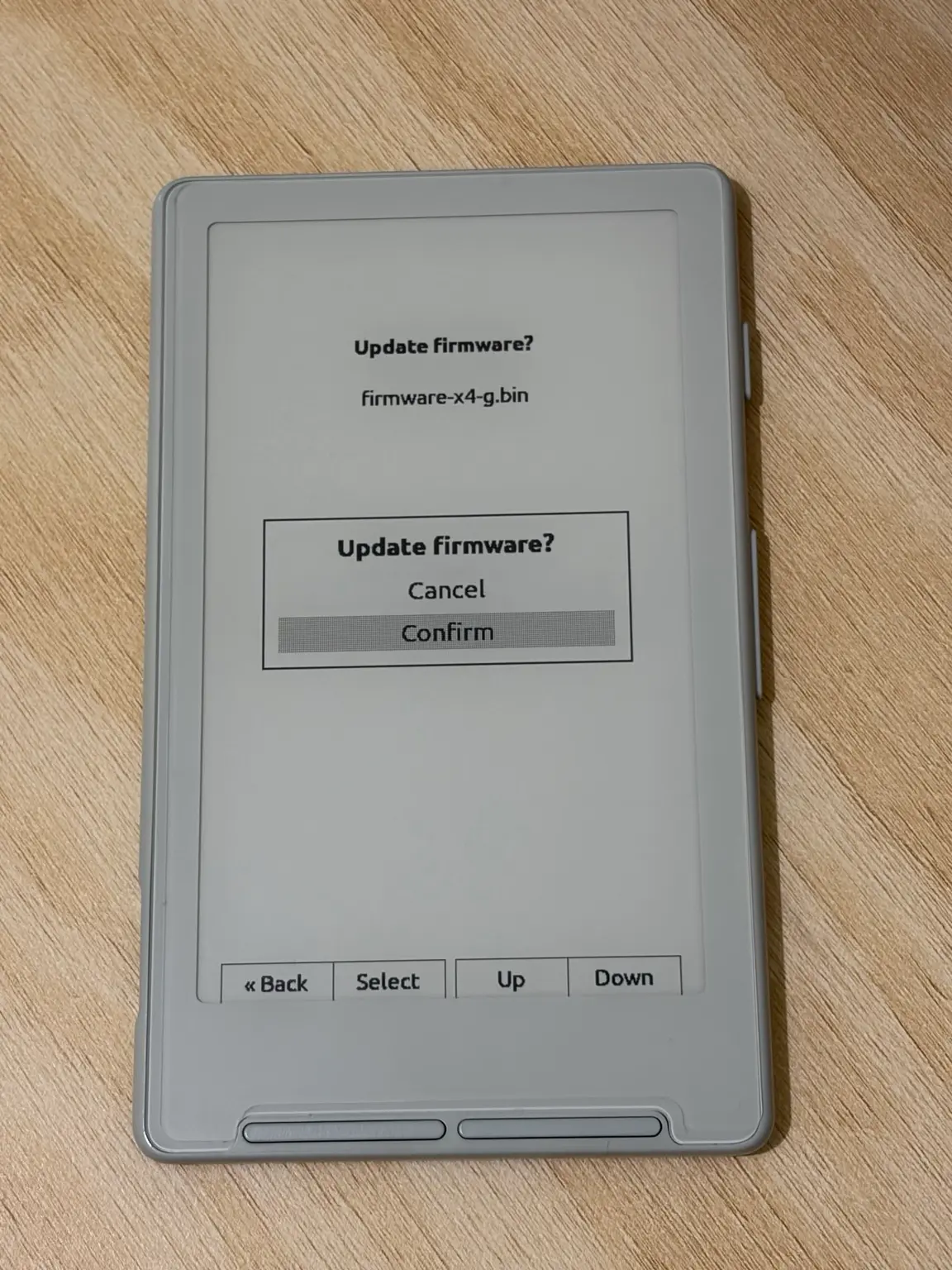 The XTEINK X4 confirmation dialog reading Update firmware? for firmware-x4-g.bin, with Confirm selected.