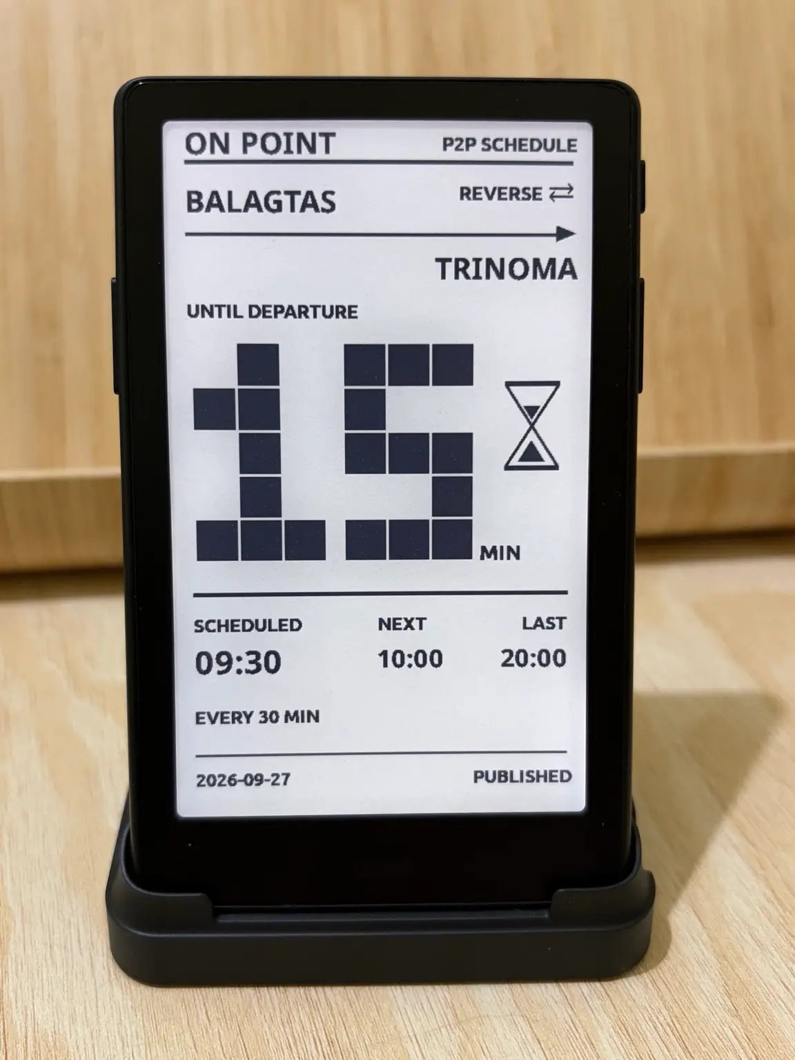 ON POINT on an XTEINK X4 Pro showing 15 minutes until the 09:30 bus from Balagtas to TriNoma.
